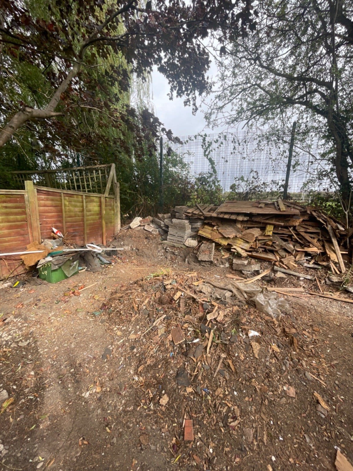 Garden waste piled up for collection by Kruze in Wakefield WF1